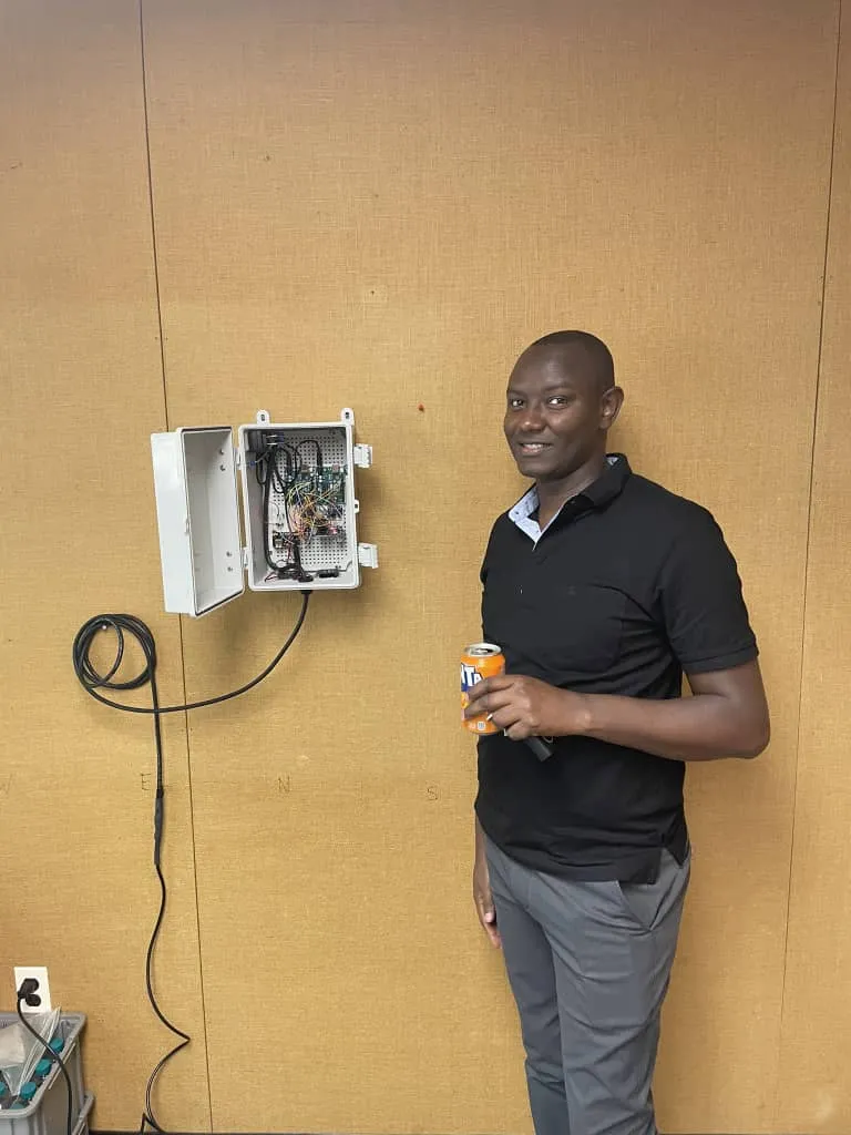 Tedy showcasing our homemade methane monitors